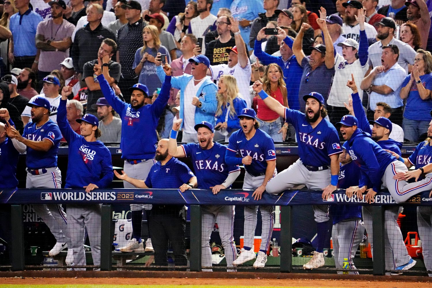 The Texas Rangers reacts after a Texas Rangers second baseman Marcus Semien (not pictured) hit a two run home run during the ninth inning against the Arizona Diamondbacks during game five of the 2023 World Series at Chase Field.